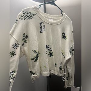 Arie slightly cropped light weight crew,perfect for summer time. Never been worn